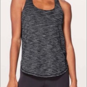 Lululemon tank top with built in bra. Gentle worn. Black and grey EUC